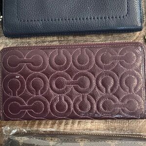 Purple Embossed Leather Wallet